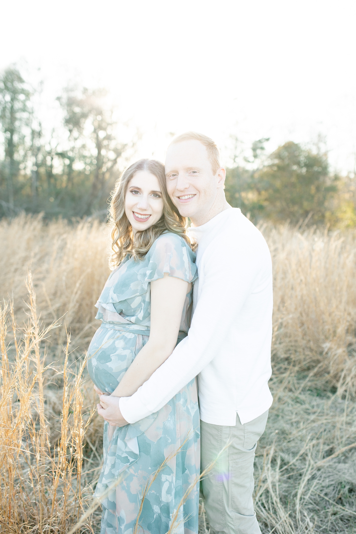 Mom and Dad to be celebrate baby boy with maternity photoshoot with Little Sunshine Photography.
