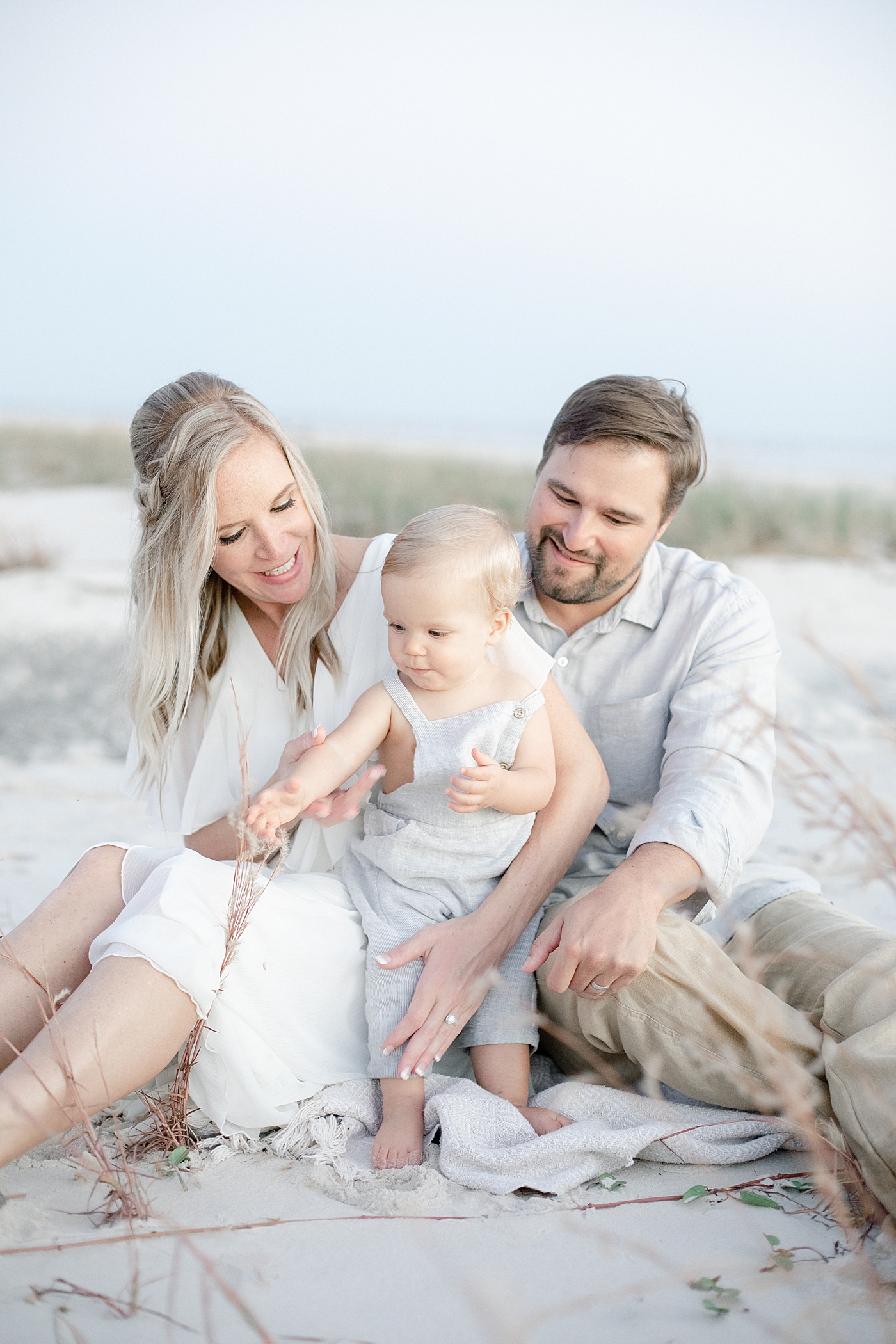 Family photos on the beach at sunset with MS Gulf Coast family photographer, Little Sunshine Photography.