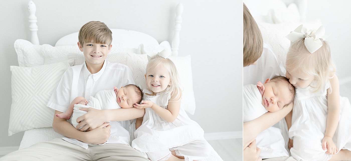 Two siblings with their newborn baby brother. Photo by Little Sunshine Photography.