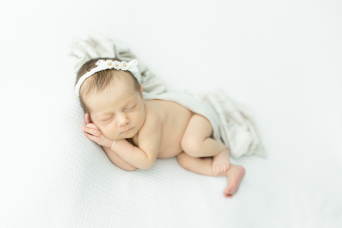 Hattiesburg studio newborn session for baby girl. Photo by Little Sunshine Photography.