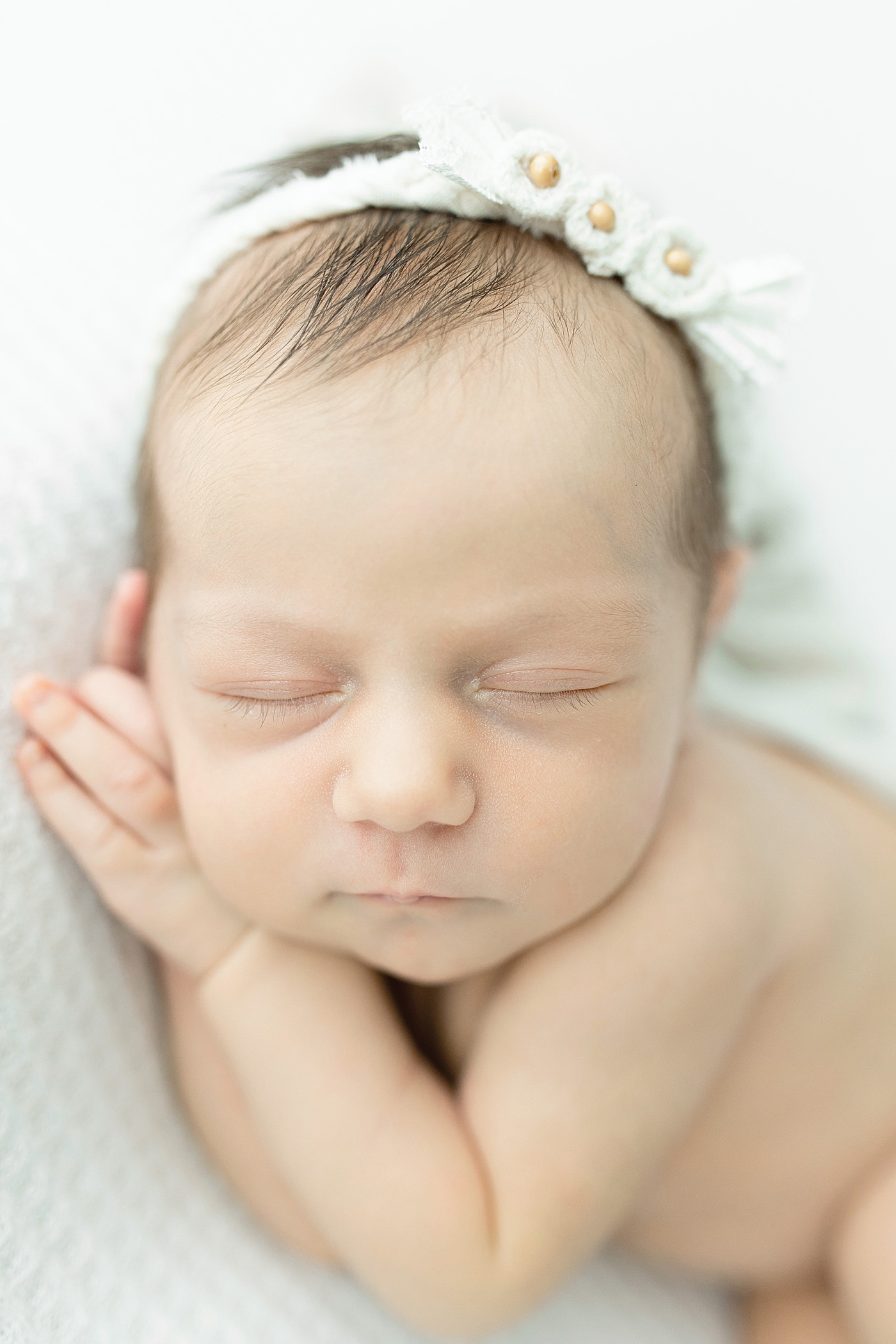 Newborn baby sleeping for photos | Photo by Little Sunshine Photography