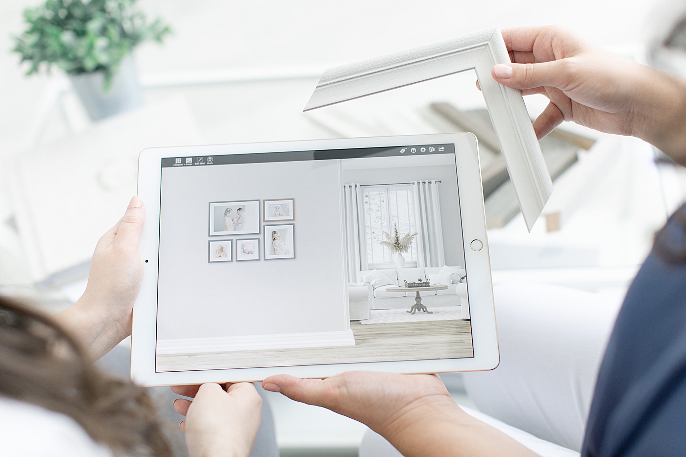 An ipad with a gallery planning software | Photo by Little Sunshine Photography