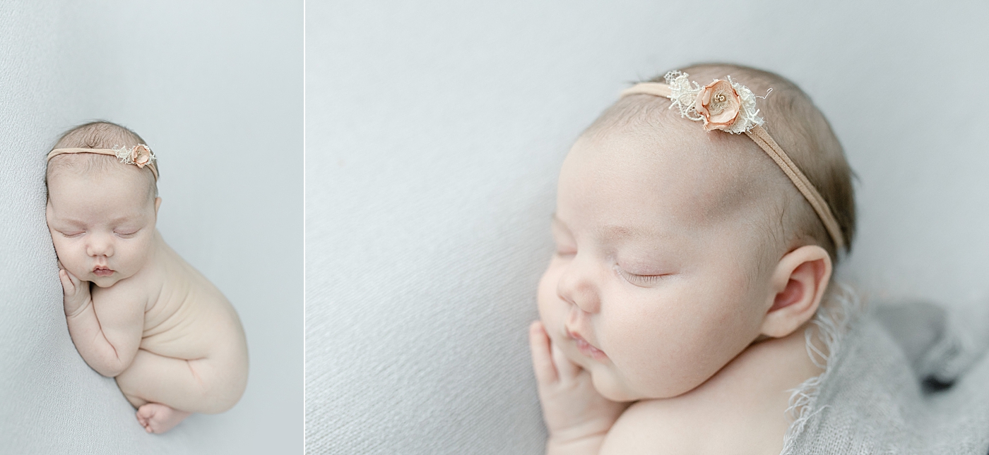 Baby girl in gray with pink rose headband | Bay St. Louis newborn photographer Little Sunshine Photography