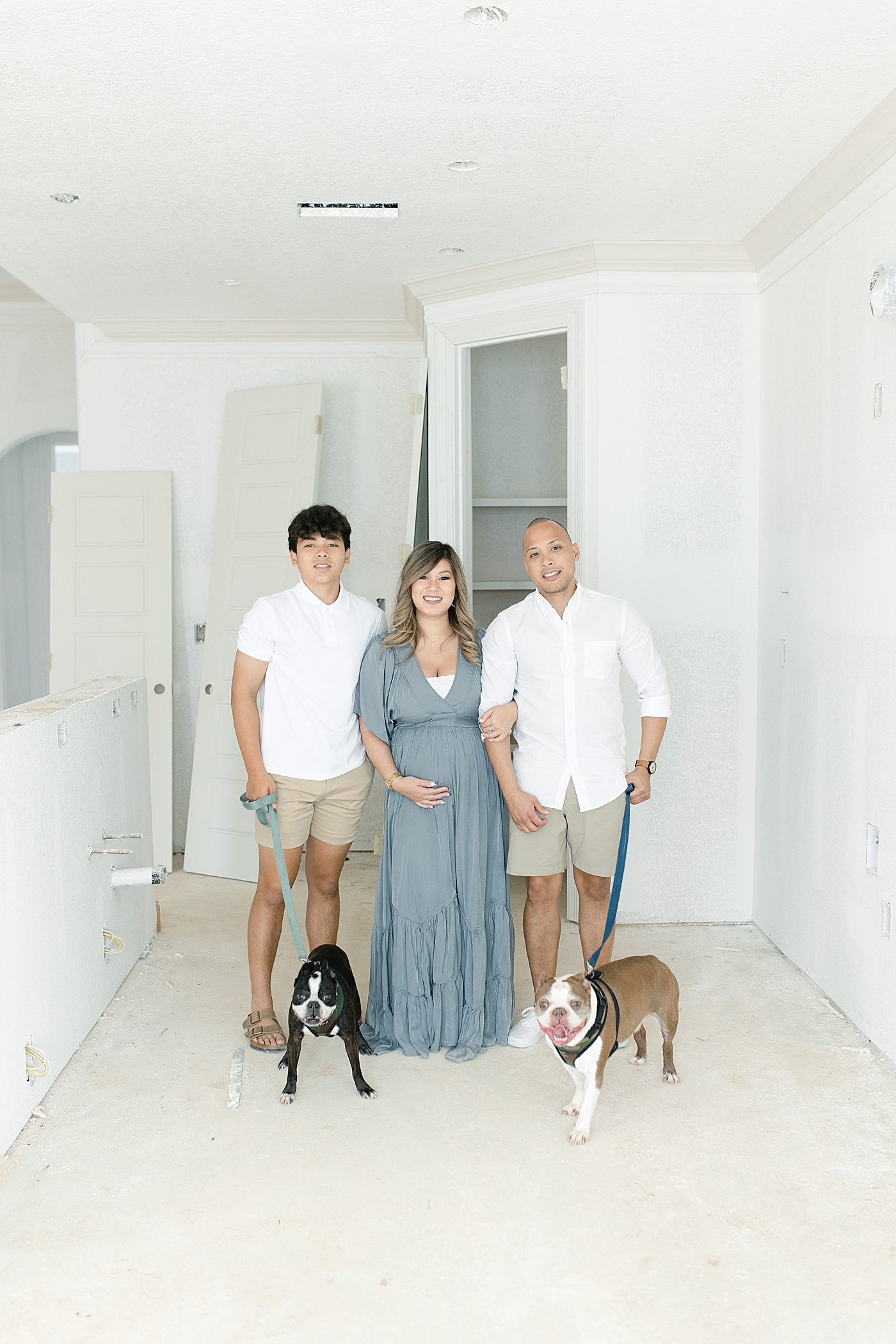 Family photos in new home before it's finished | Photo by Little Sunshine Photography 