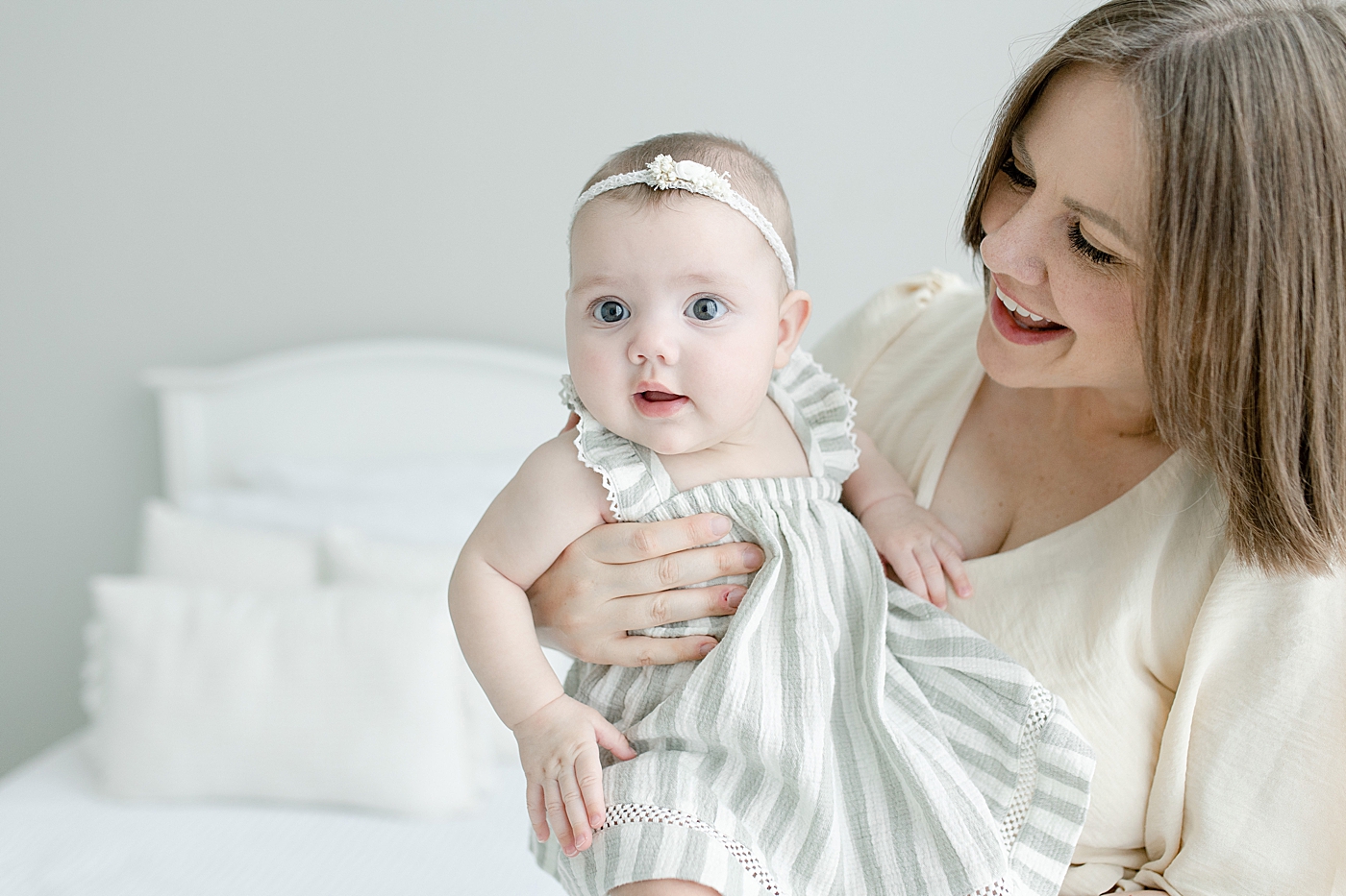Mom and four month old baby girl interacting | Photo by Little Sunshine Photography