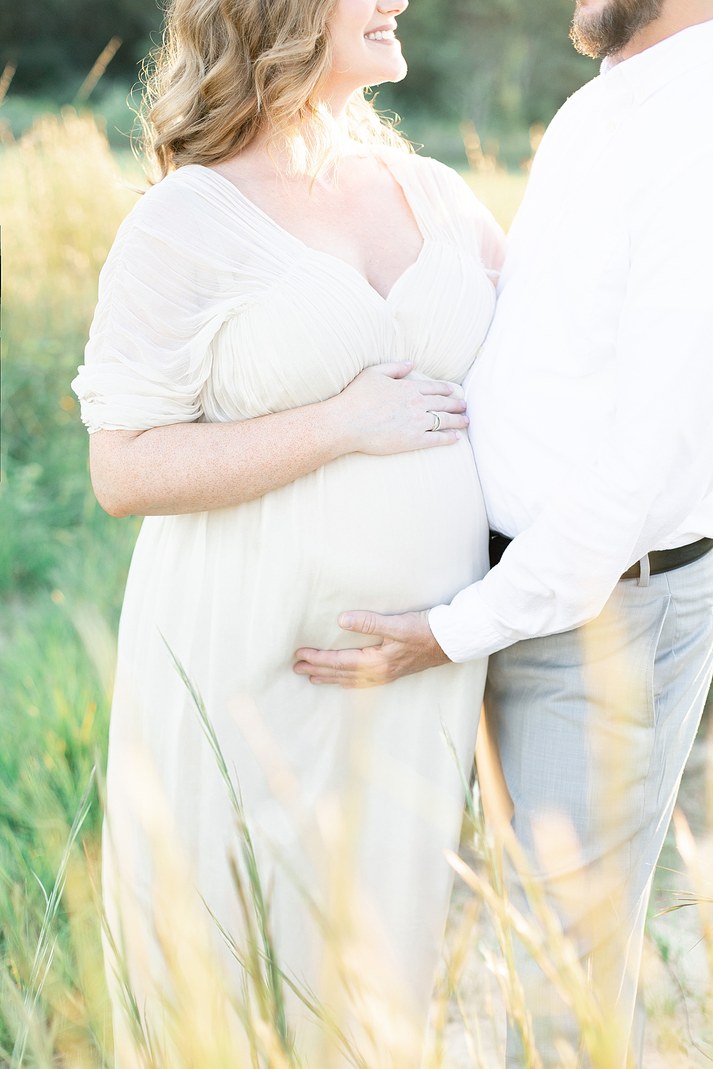 Detail image of moms hand on her belly | Photo by Ocean Springs MS Maternity Photographer Little Sunshine Photography 
