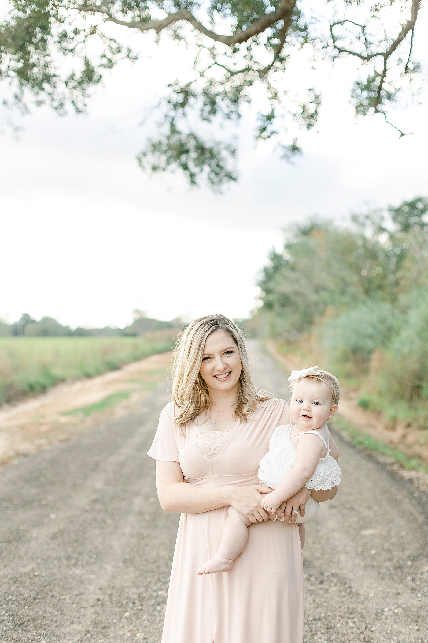 Mom walking with baby girl | Photo by Hattiesburg MS family photographer Little Sunshine Photography 