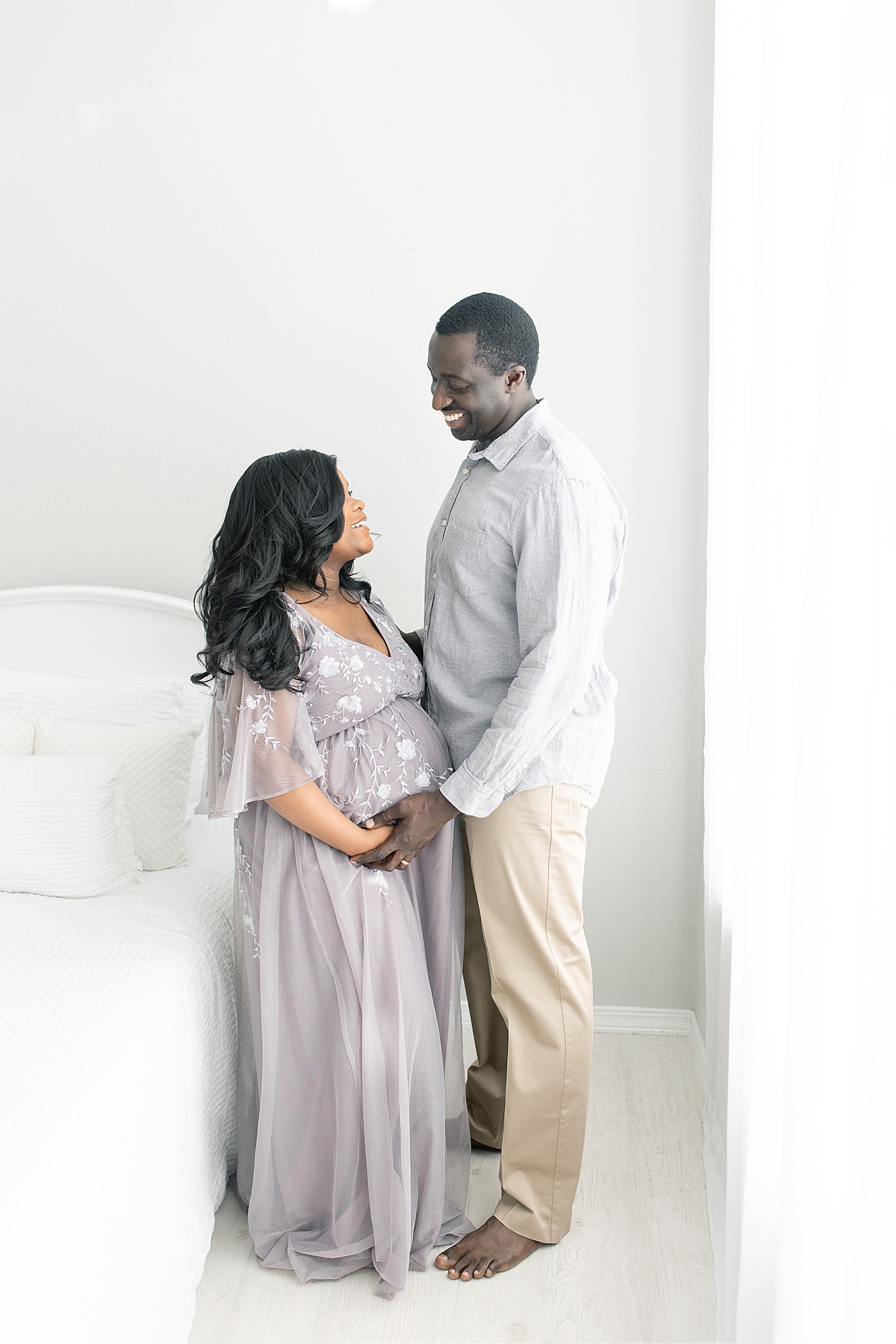 Mother and father to be in the studio | Photo by Little Sunshine Photography