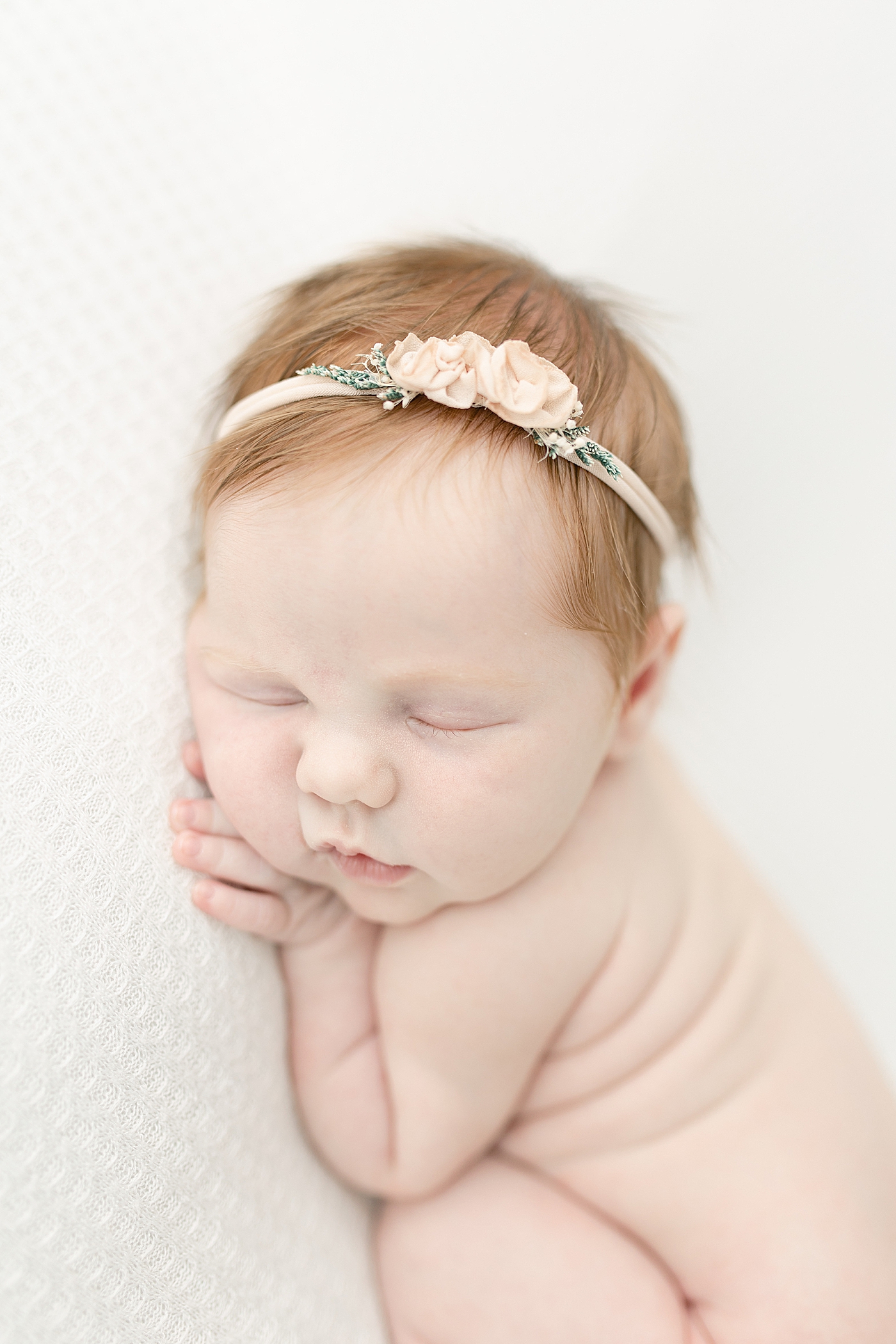 Detail of baby girl in rose headband | Photo by Little Sunshine Photography